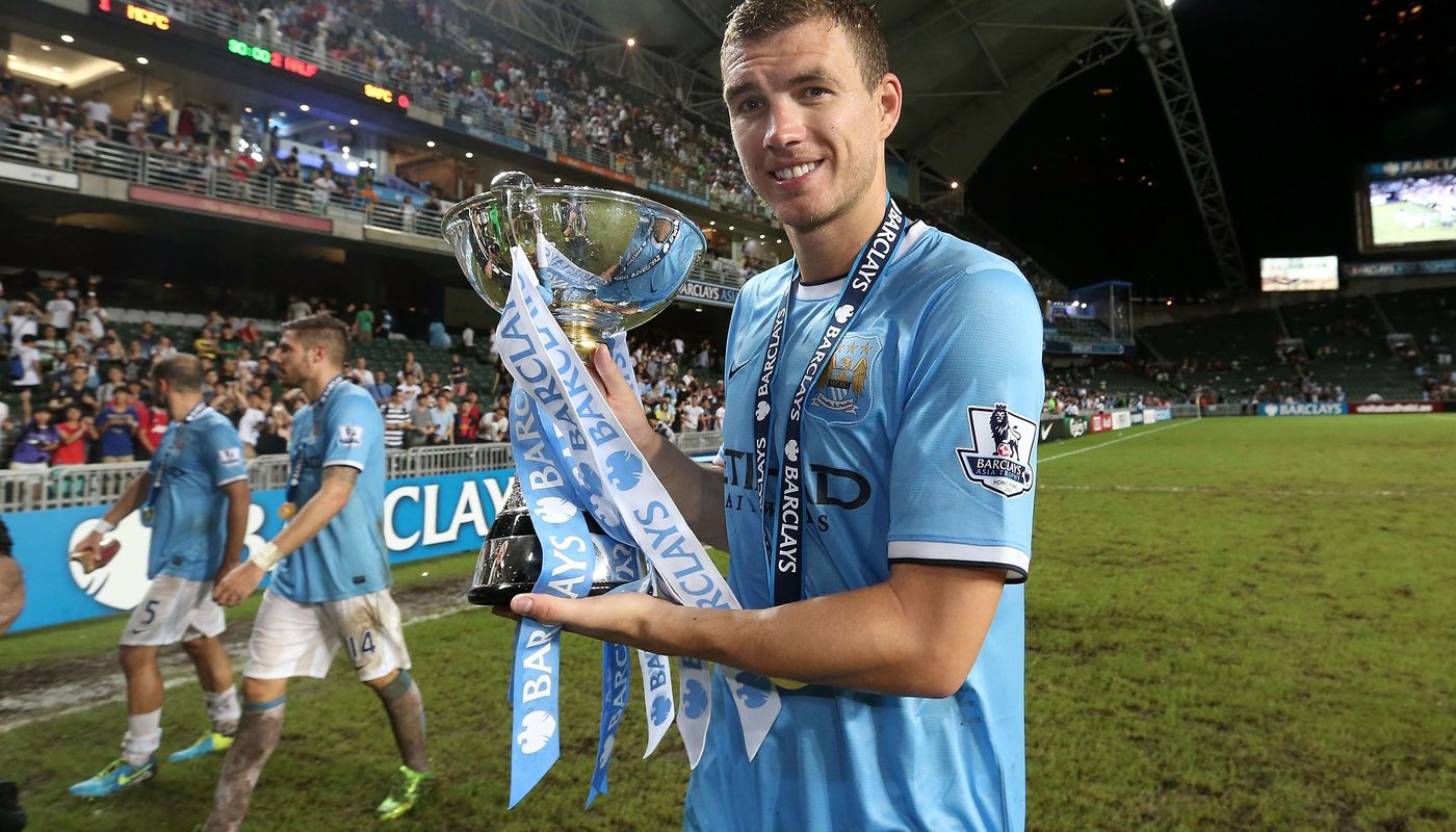 Edin Dzeko with the 2013 Asia Trophy